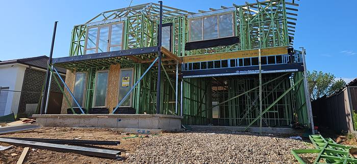Sydney duplex under construction — steel frame and structural build stage